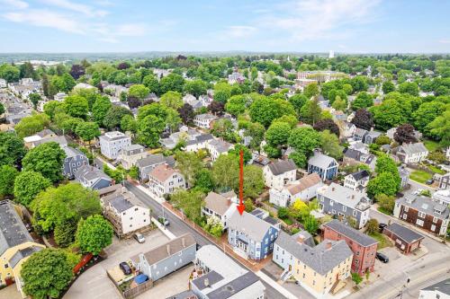 an aerial view of a town with houses and trees at Steps to Downtown Rooftop Deck Flexible Temp Stay in Newburyport