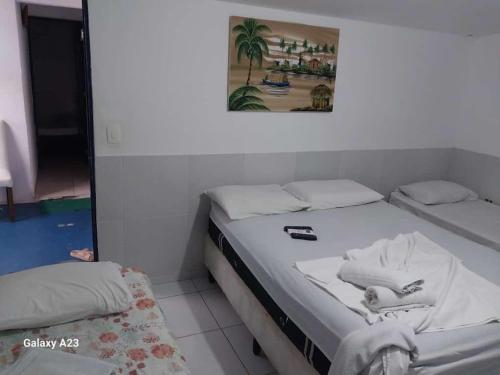 Cama o camas de una habitación en Pousada Porto Marola