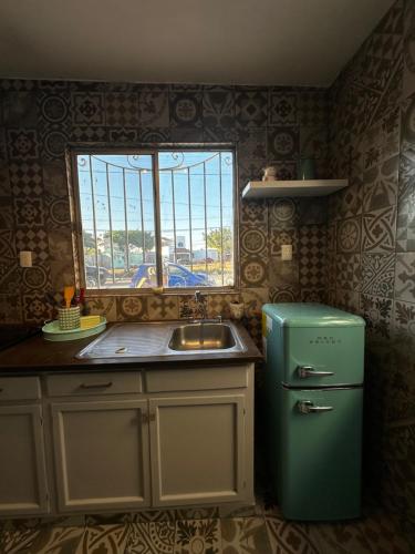 Kuchyň nebo kuchyňský kout v ubytování Casa Cerritos