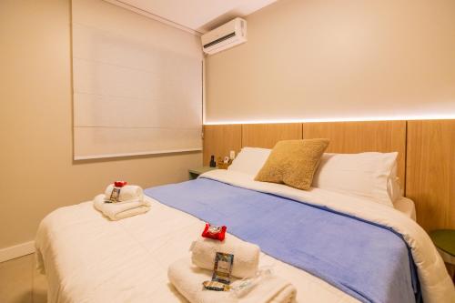 Llit o llits en una habitació de Rentaqui - Apartament Paulista Wall Street Diamond