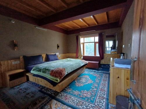 Postel nebo postele na pokoji v ubytování Kunzom Inn Tabo