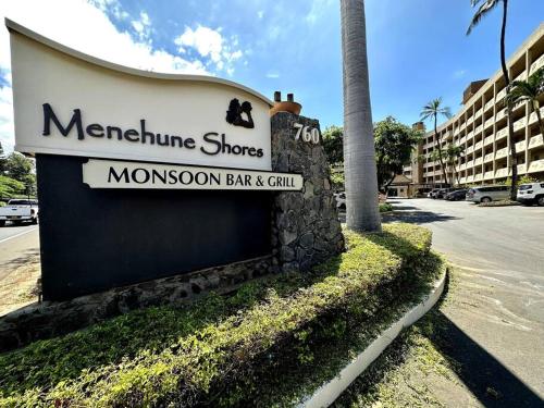 a sign for a mushroom bar and grill on a street at Beautiful Oceanfront, AC In Each Room, Sleeps 6 in Kihei