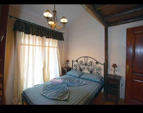 Postel nebo postele na pokoji v ubytování Έν Λεβίδι