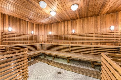 a empty lecture hall with wooden benches and lights at Luxury 2Br Condo Entertainment District Downtown CN Tower View Balcony Pool & Hot Tub in Toronto