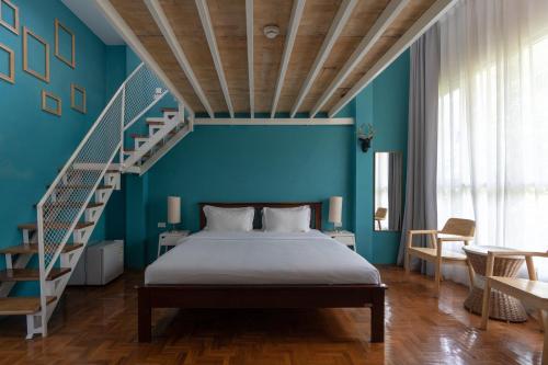 Ένα ή περισσότερα κρεβάτια σε δωμάτιο στο Mammoth Boutique Hotel