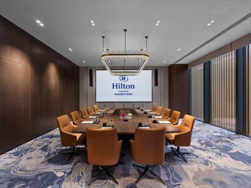 Zona business o sala de conferencias en Hilton Changshu