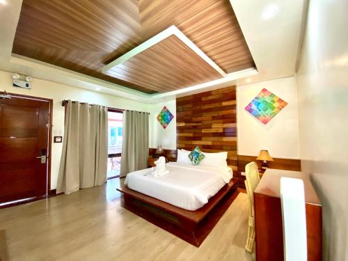 Postel nebo postele na pokoji v ubytování The Nest El Nido Beach Resort