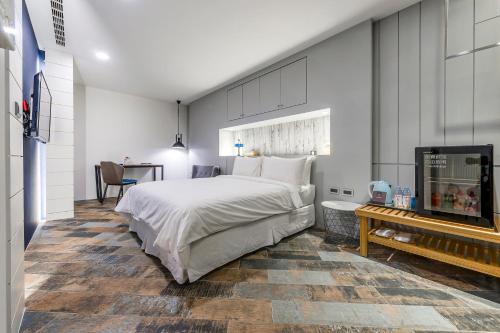 Han Yan Design Hotelにあるベッド