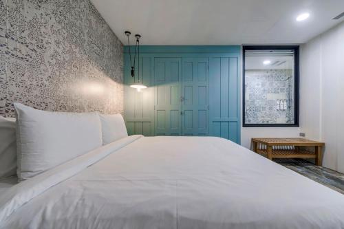Han Yan Design Hotelにあるベッド