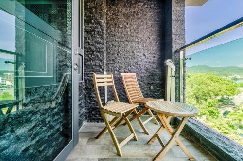 Han Yan Design Hotelにあるバルコニーまたはテラス