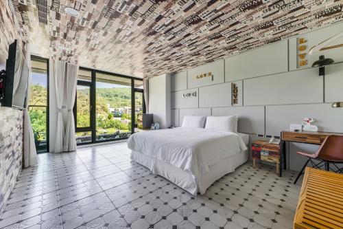 Han Yan Design Hotelにあるベッド
