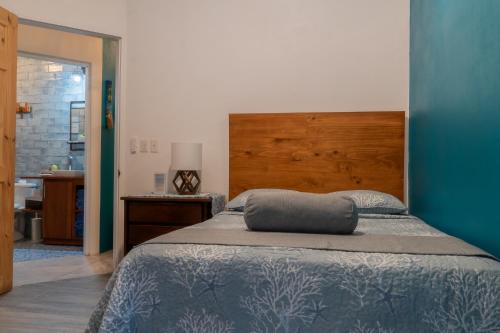 Ένα ή περισσότερα κρεβάτια σε δωμάτιο στο Casa Choucoune
