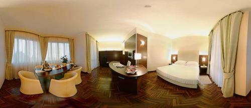 Posteľ alebo postele v izbe v ubytovaní Hotel Habitat