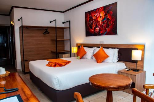 Postel nebo postele na pokoji v ubytování Hotel Boulevard Nairobi, City Centre CBD