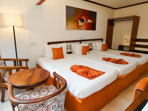 Postel nebo postele na pokoji v ubytování Hotel Boulevard Nairobi, City Centre CBD