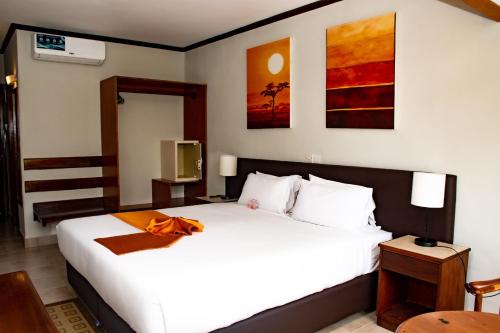 Postel nebo postele na pokoji v ubytování Hotel Boulevard Nairobi, City Centre CBD