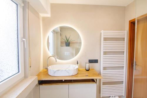 Koupelna v ubytování Shiny Singapore Room - Homestay - Doppelzimmer mit Gemeinschaftsbad