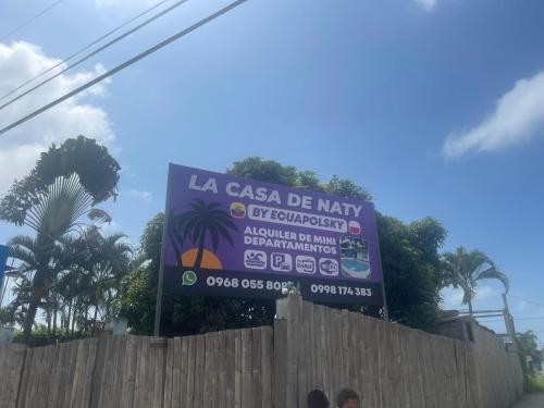 a sign for a las casitas be mix consulate at La casa de naty by Ecuapolsky in Tonsupa