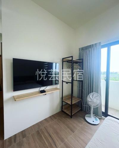 TV a/nebo společenská místnost v ubytování Yueyun B&B
