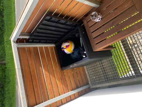 an overhead view of a dog house with a volleyball at Apartmány Vodohospodár in Mýto pod Ďumbierom