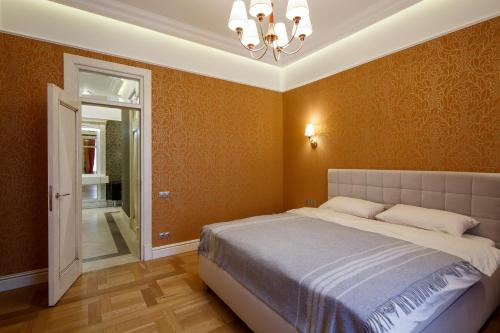 Кровать или кровати в номере Villa Lido apartments