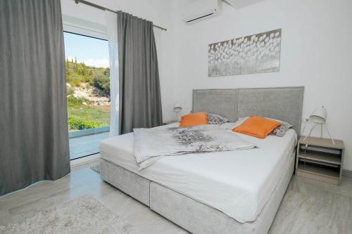 Ένα ή περισσότερα κρεβάτια σε δωμάτιο στο Villa Matanovi Dvori