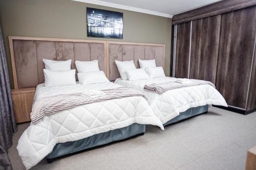 Katil atau katil-katil dalam bilik di Mountain Top Luxury Villas