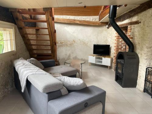 TV a/nebo společenská místnost v ubytování Gîte le village des champs