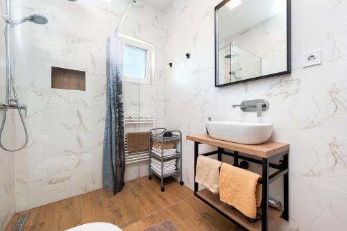 Kúpeľňa v ubytovaní Apartments Euphemia
