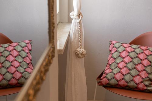 Una cama o camas en una habitación de GLAM PARMA