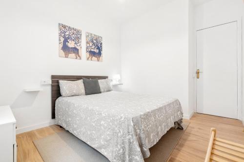 Ένα ή περισσότερα κρεβάτια σε δωμάτιο στο Barcelona coast apartment - only 5 minutes to the beach