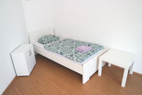 Ένα ή περισσότερα κρεβάτια σε δωμάτιο στο Nice Apartment in Vöhringen