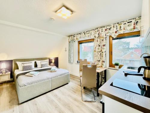 Postel nebo postele na pokoji v ubytování Möwennest App 1