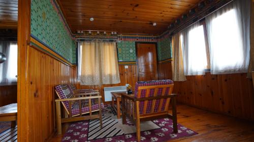 Ein Sitzbereich in der Unterkunft Hotel Olathang