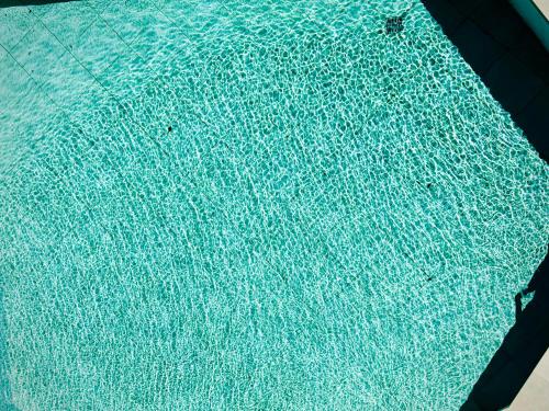 an overhead view of a pool of blue water at Hotel Amfora in St. St. Constantine and Helena