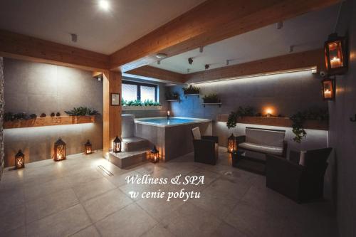 a rendering of a pool room with a fireplace at Willa Litworówka III Wellness&SPA in Poronin