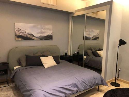 Postel nebo postele na pokoji v ubytování luxury apartment in boulevard
