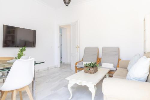 Μια τηλεόραση ή/και κέντρο ψυχαγωγίας στο Apartamento con terraza en Playa de Regla 6