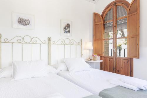 Ένα ή περισσότερα κρεβάτια σε δωμάτιο στο Apartamento con terraza en Playa de Regla 6