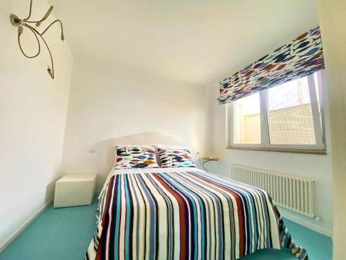 Postel nebo postele na pokoji v ubytování V12 Apartments Puglia Polignano a Mare