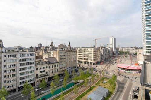 a view of a city with buildings and a street at YAYS Antwerp Opera by Numa in Antwerp