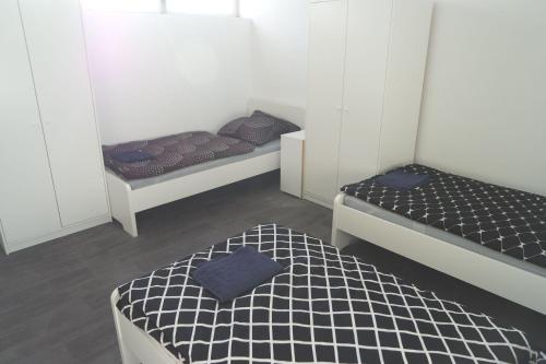 Ένα ή περισσότερα κρεβάτια σε δωμάτιο στο Nice Apartment in Vöhringen