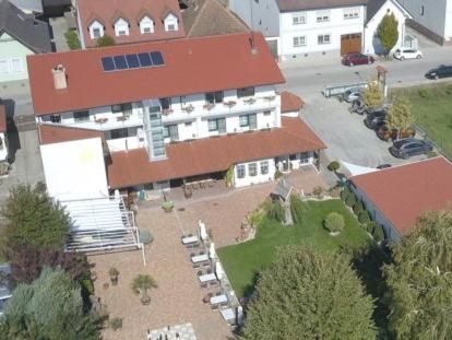 an aerial view of a large house with a yard at Pension Sonnenhof in Mörbisch am See