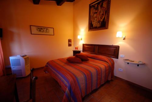 Una cama o camas en una habitación de Locanda All'Andreas