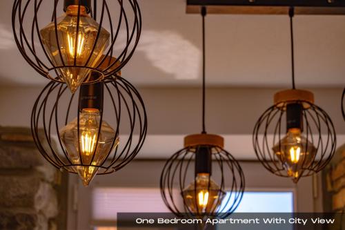 a group of lights hanging from a ceiling at Villa Volos , free private parking in Opatija
