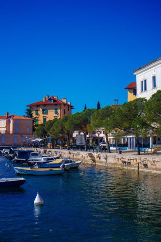 a group of boats are docked in a harbor at Villa Volos , free private parking in Opatija