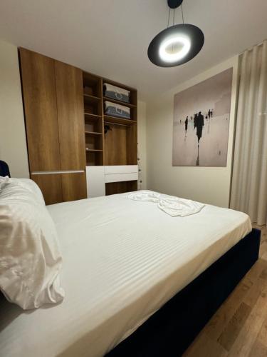 Katil atau katil-katil dalam bilik di Tirana Primo Apartment