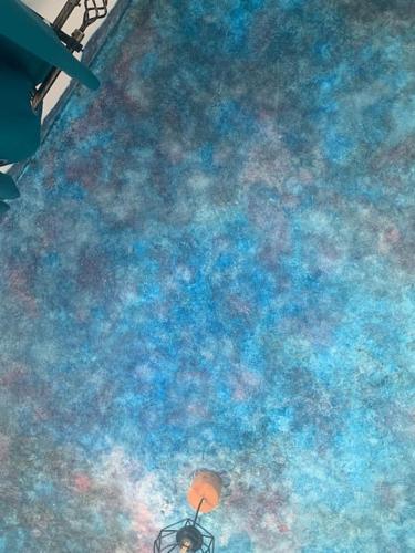 an overhead view of a rug with a light on it at Γ2 - The sunlight one in Aígio