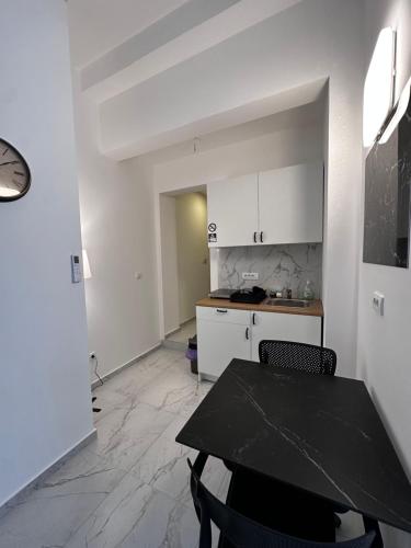Kuchyň nebo kuchyňský kout v ubytování Residence Spa Apartments DUB