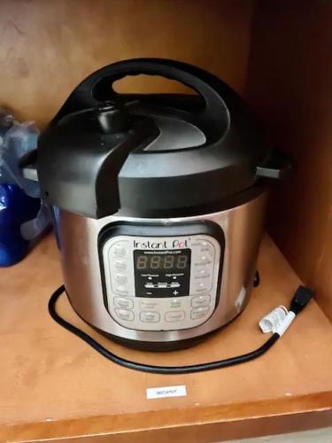 a slow cooker sitting on top of a table at Modern Private Unit With Serene Backyard in San Jose